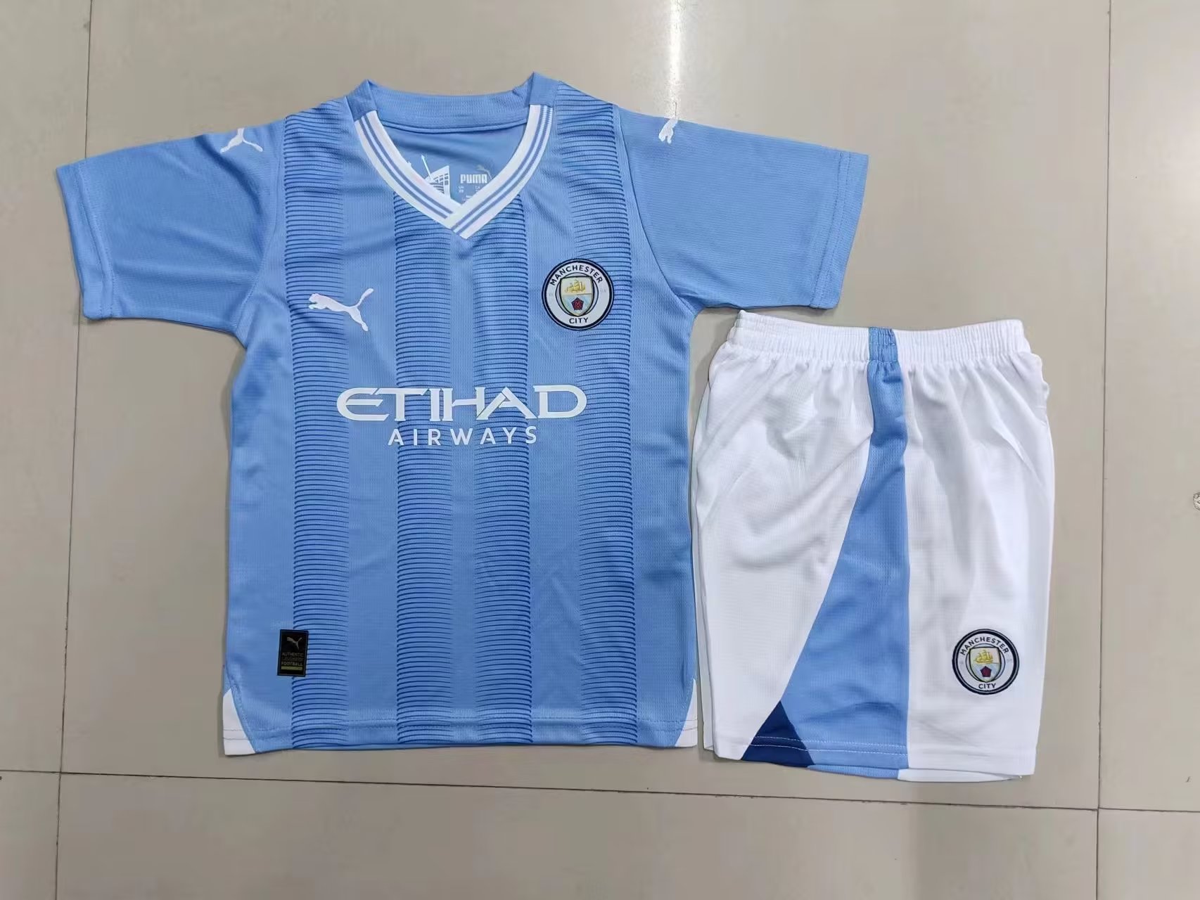 2023/2024 Manchester City home kids kit 